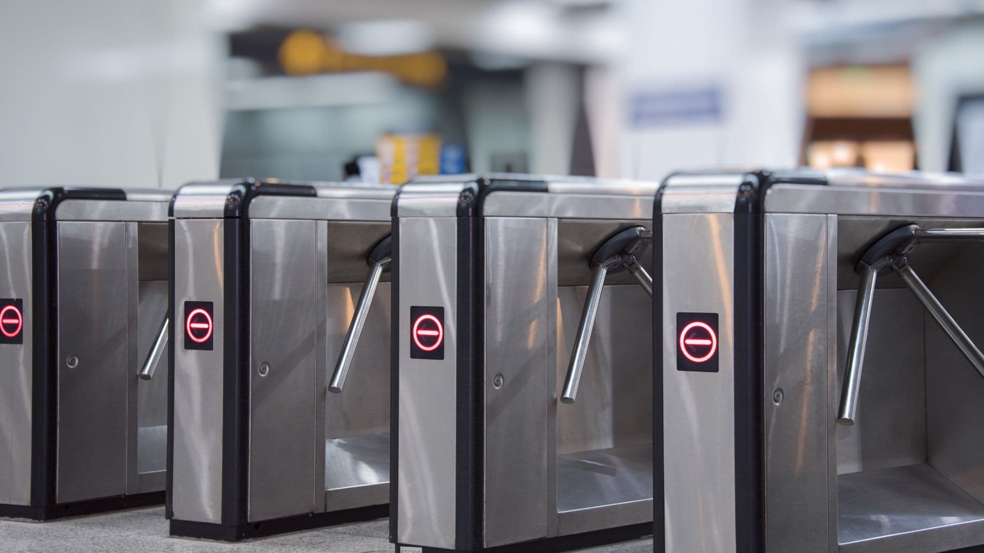 An image of a ticket gate. The image is from www.freepik.com